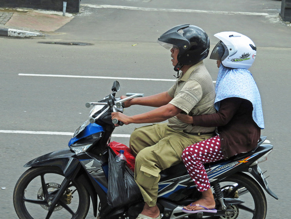 Couple on motorcycle
