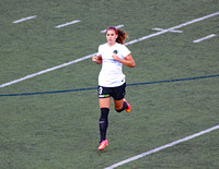 Alex Morgan running cross field