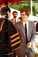 Receiving diploma from president Starr